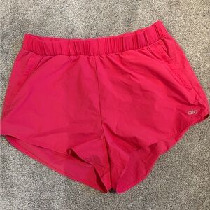 Pink Alo Playmaker Dolphin shorts, size medium